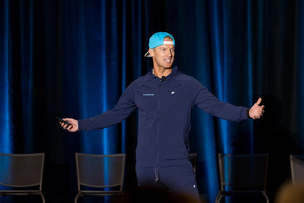 Devan Kline speaks onstage during Burn Summit 2026