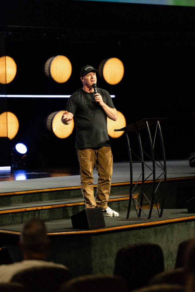 Paul Worcester speaks from the stage at SBTC Collegiate Roundup 2026.